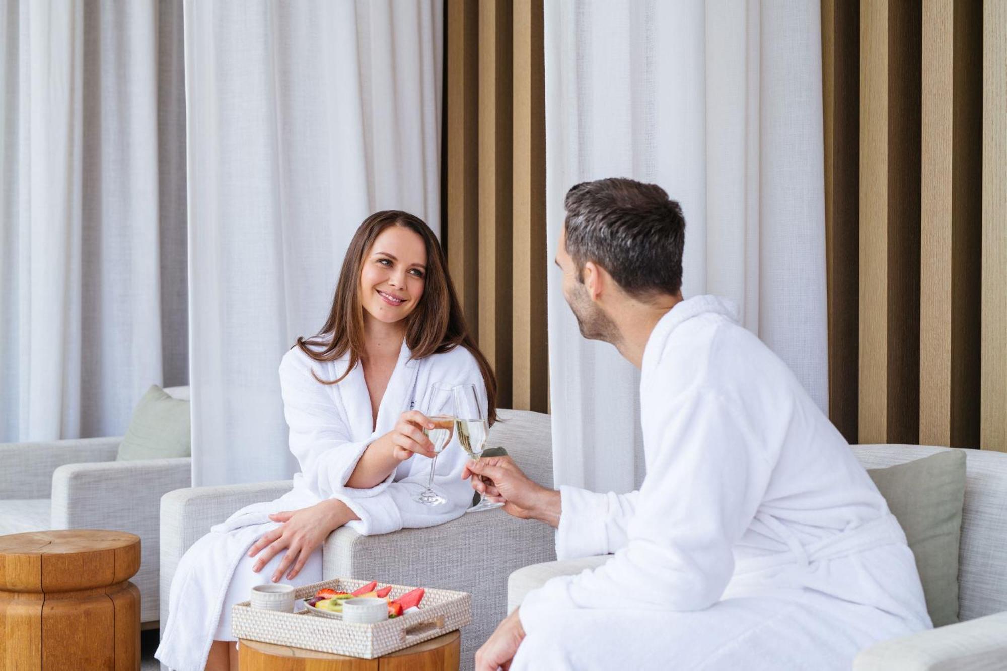 The Westin Perth Hotel Exterior photo A couple wearing bathrobes